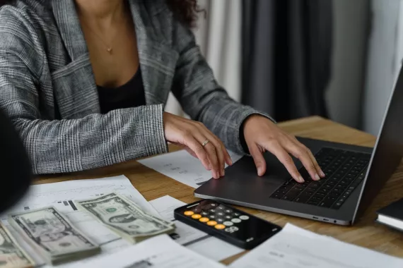 Woman doing her financial planning on her laptop